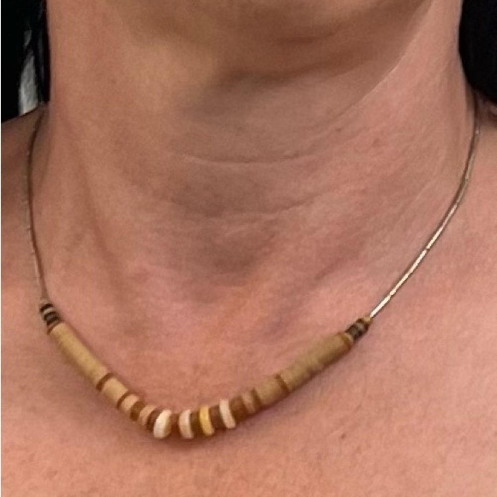 Vintage Necklace with Silver beads around the neck and Front Focal Point Beads